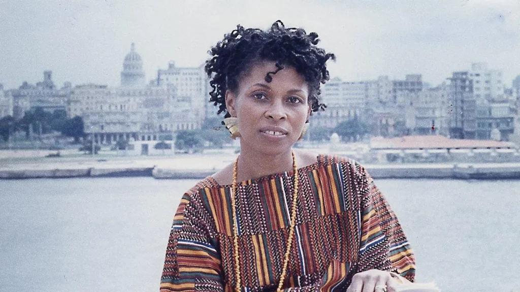 Havana, Cuba: JoAnn Chesimard, aka Assata Shakur , holding the manuscript of her autobiography with Old Havana, Cuba, in the background on October 7, 1987. (Ozier Muhammad/Newsday RM via Getty Images)