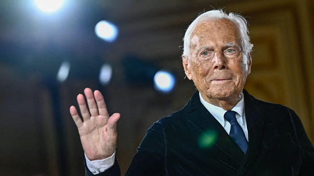 Italian designer Giorgio Armani acknowledges the applause at the end of his presentation for Armani Prive during the Women's Haute-Couture Spring/Summer 2025 Fashion Week to mark its 20th anniversary, in Paris on Jan. 28, 2025. (Julien de Rosa/AFP via Getty Images / Getty Images)