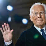 Italian designer Giorgio Armani acknowledges the applause at the end of his presentation for Armani Prive during the Women's Haute-Couture Spring/Summer 2025 Fashion Week to mark its 20th anniversary, in Paris on Jan. 28, 2025. (Julien de Rosa/AFP via Getty Images / Getty Images)